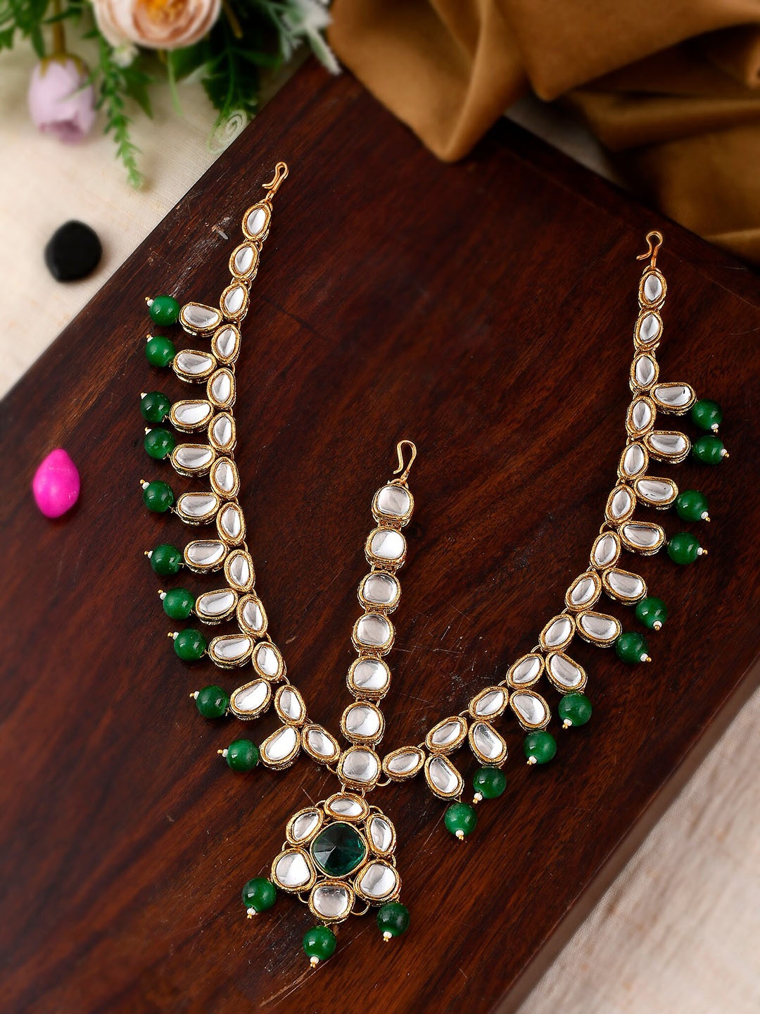 

Shoshaa Gold-Plated Green & White Kundan Studded & Beaded Handcrafted Matha patti