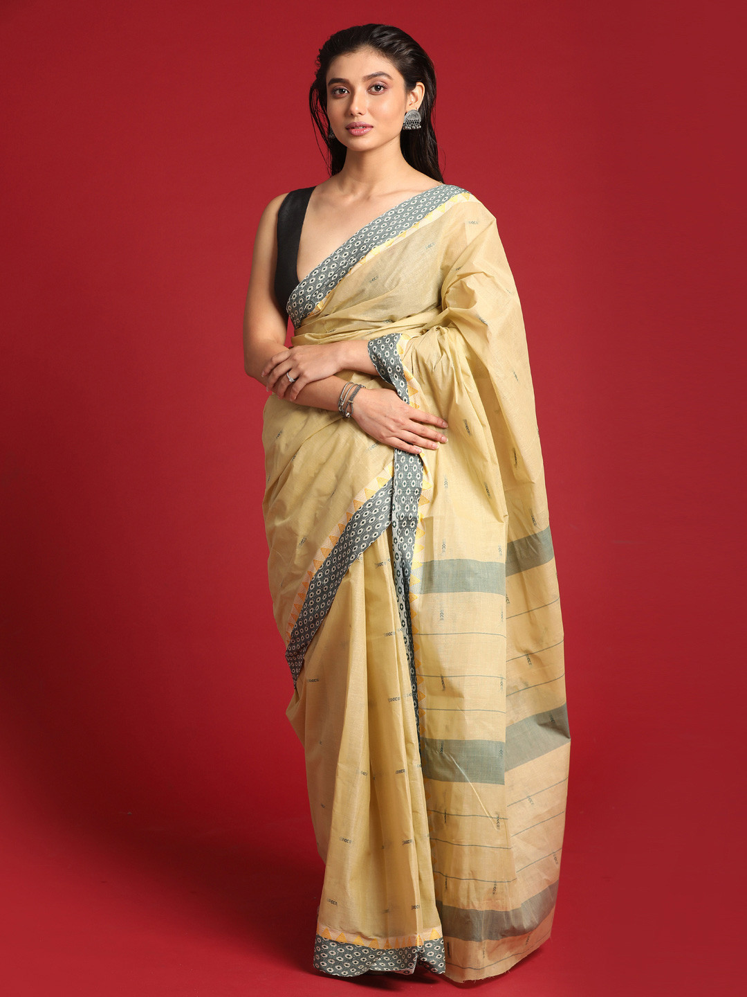 

Indethnic Beige & Yellow Pure Cotton Taant Saree