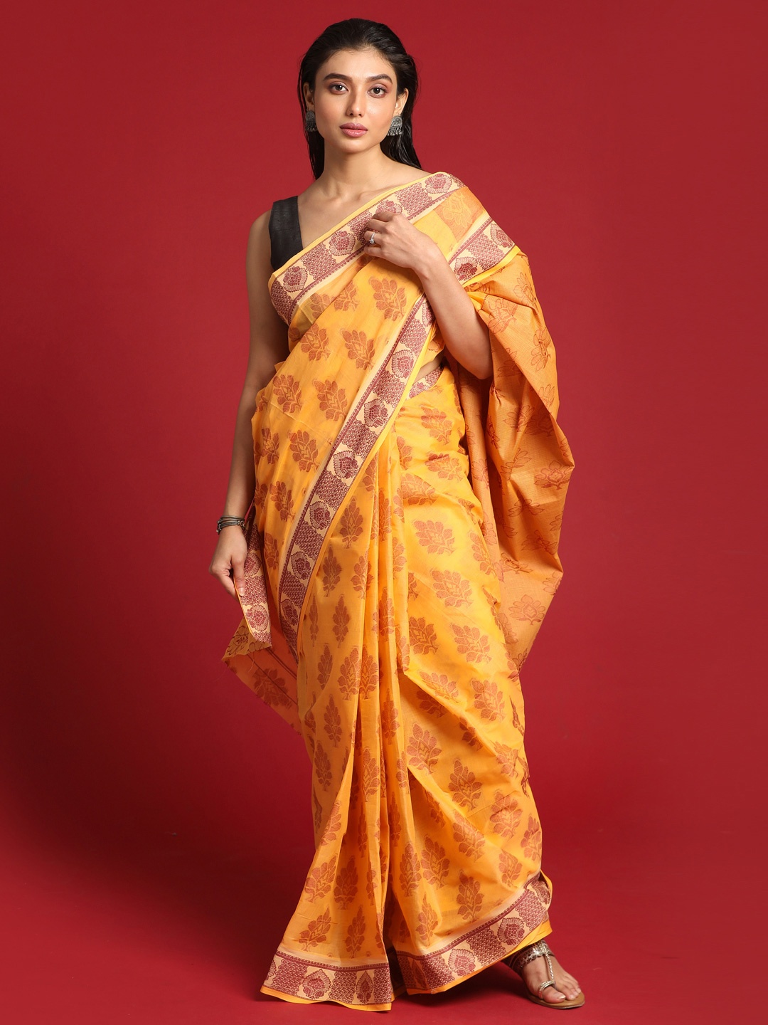 

Saranee Yellow & Red Ethnic Motifs Pure Cotton Taant Saree
