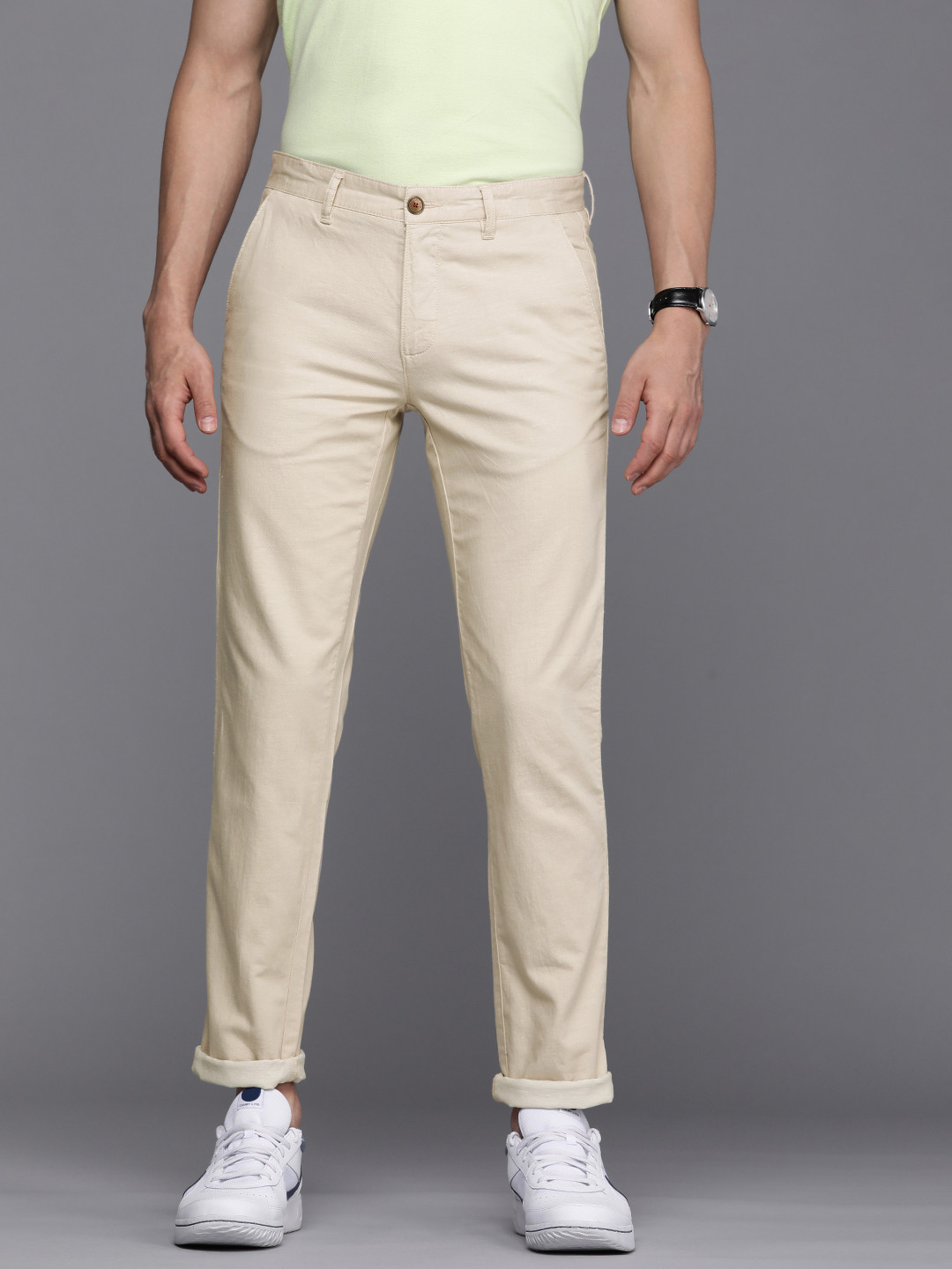 

Louis Philippe Sport Men Beige Solid Tapered Fit Trousers