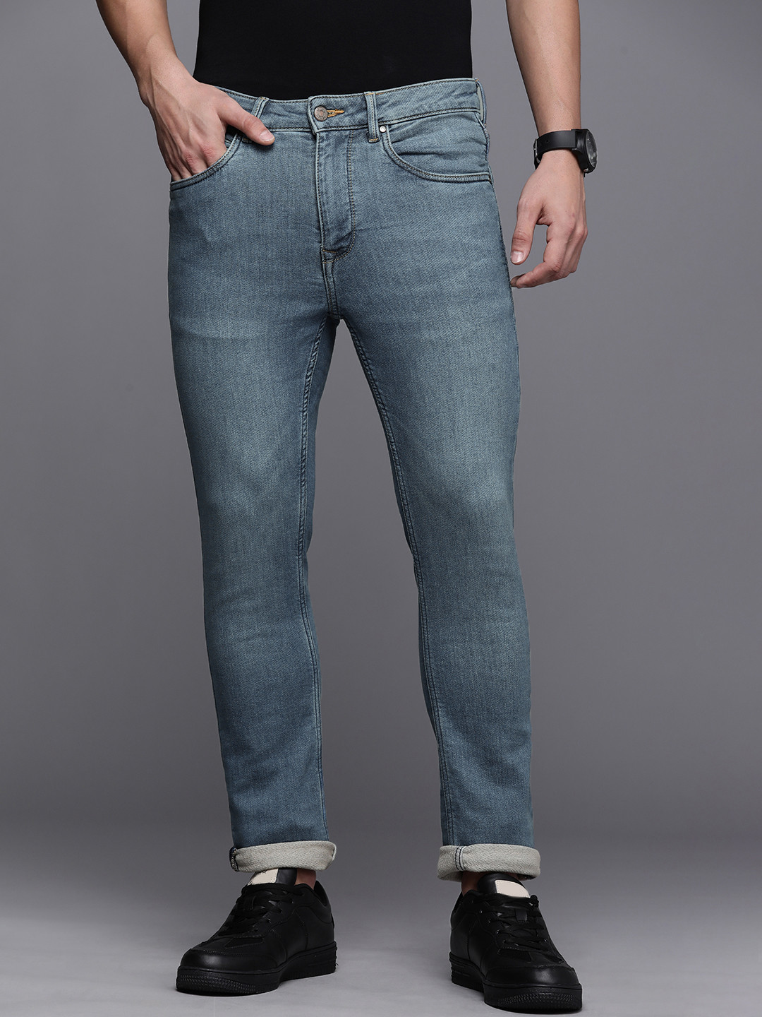

Louis Philippe Jeans Men Blue Slim Fit Mid-Rise Light Fade Stretchable Jeans
