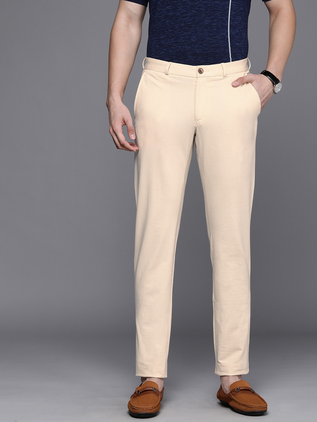 

Louis Philippe Sport Men Beige Textured Slim Fit Low-Rise Chinos