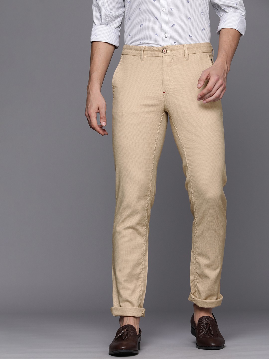 

Louis Philippe Sport Men Beige Textured Slim Fit Trousers