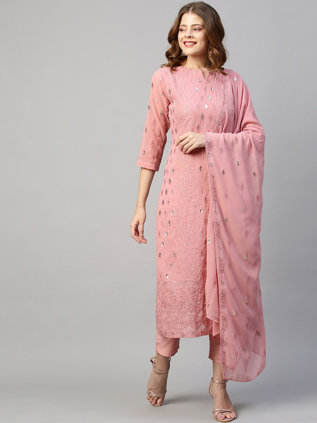 

FASHOR Women Pink Embroidered Pleated Sequinned Kurti with Trousers & With Dupatta