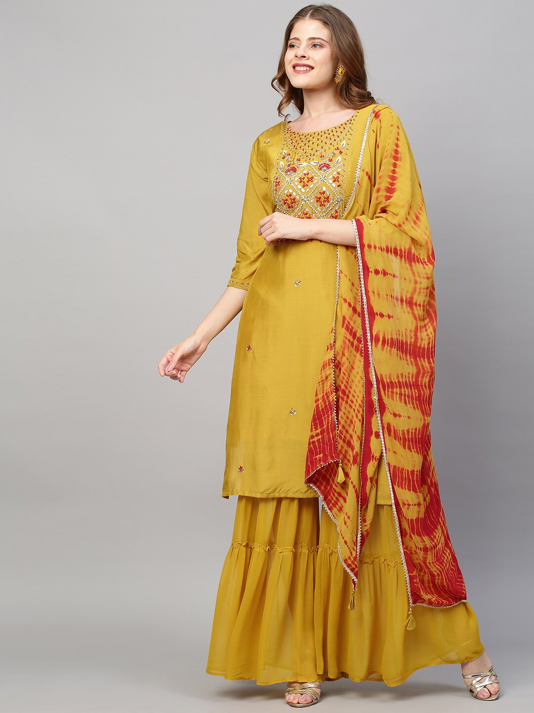 

FASHOR Women Mustard Yellow Ethnic Motifs Printed Kurta with Sharara & With Dupatta