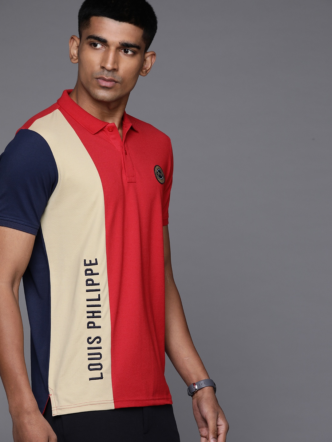 

Louis Philippe Sport Men Red & Beige Brand Logo Colourblocked Polo Collar T-shirt
