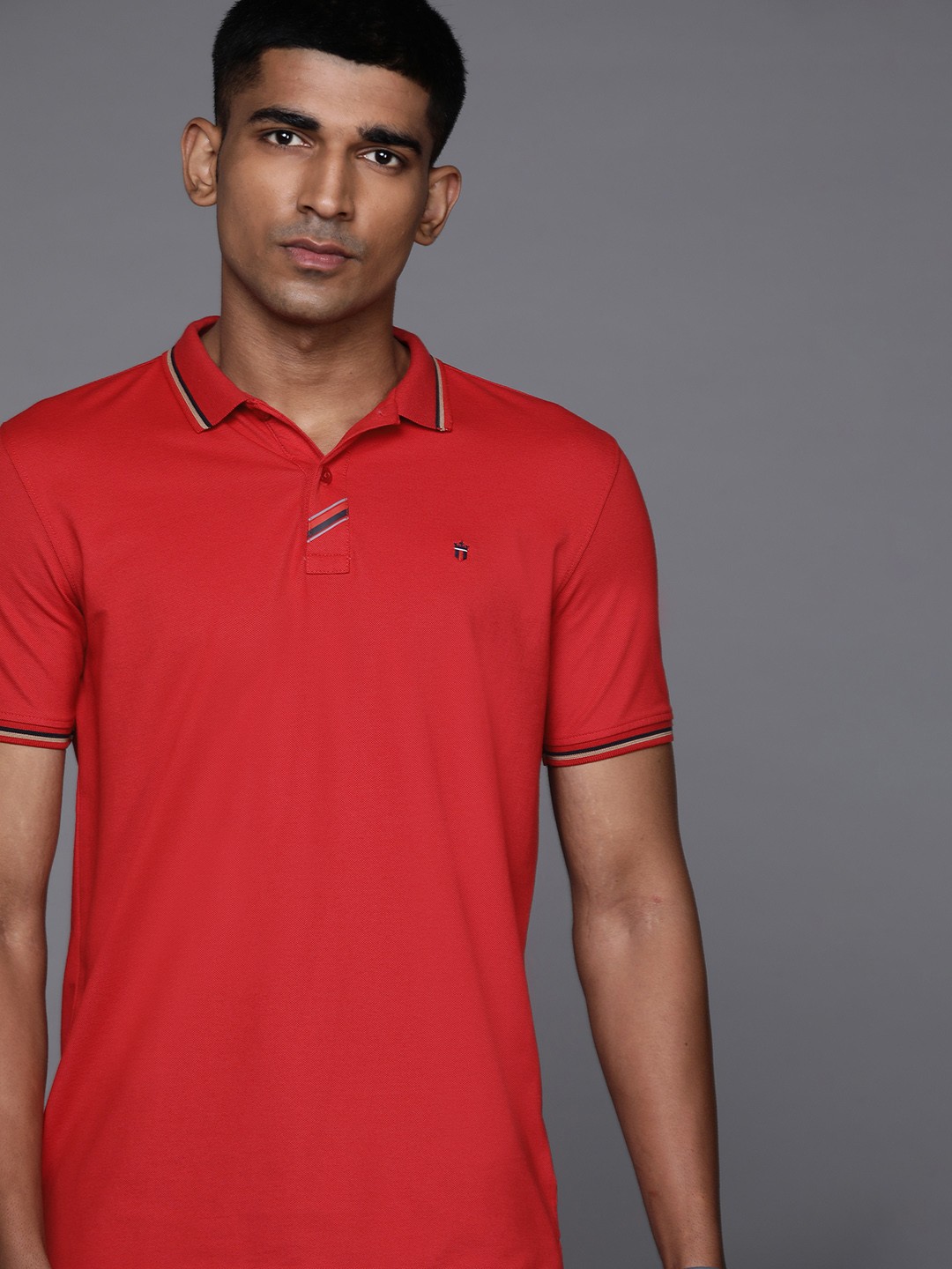 

Louis Philippe Sport Men Red Solid Polo Collar T-shirt