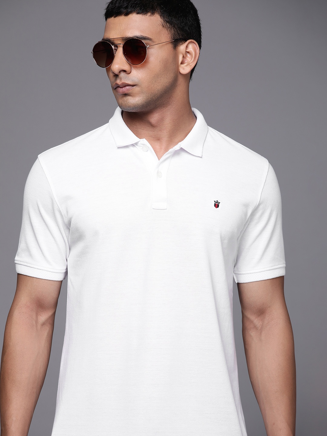 

Louis Philippe Sport Men White Solid Polo Collar T-shirt