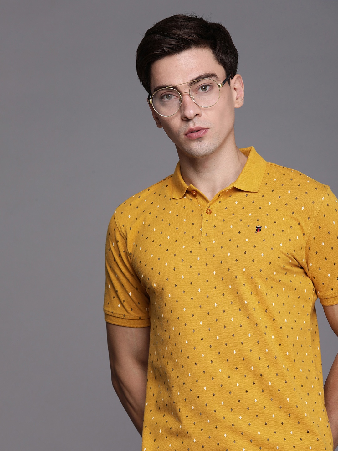 

Louis Philippe Sport Men Mustard Yellow & Black Printed Polo Collar T-shirt