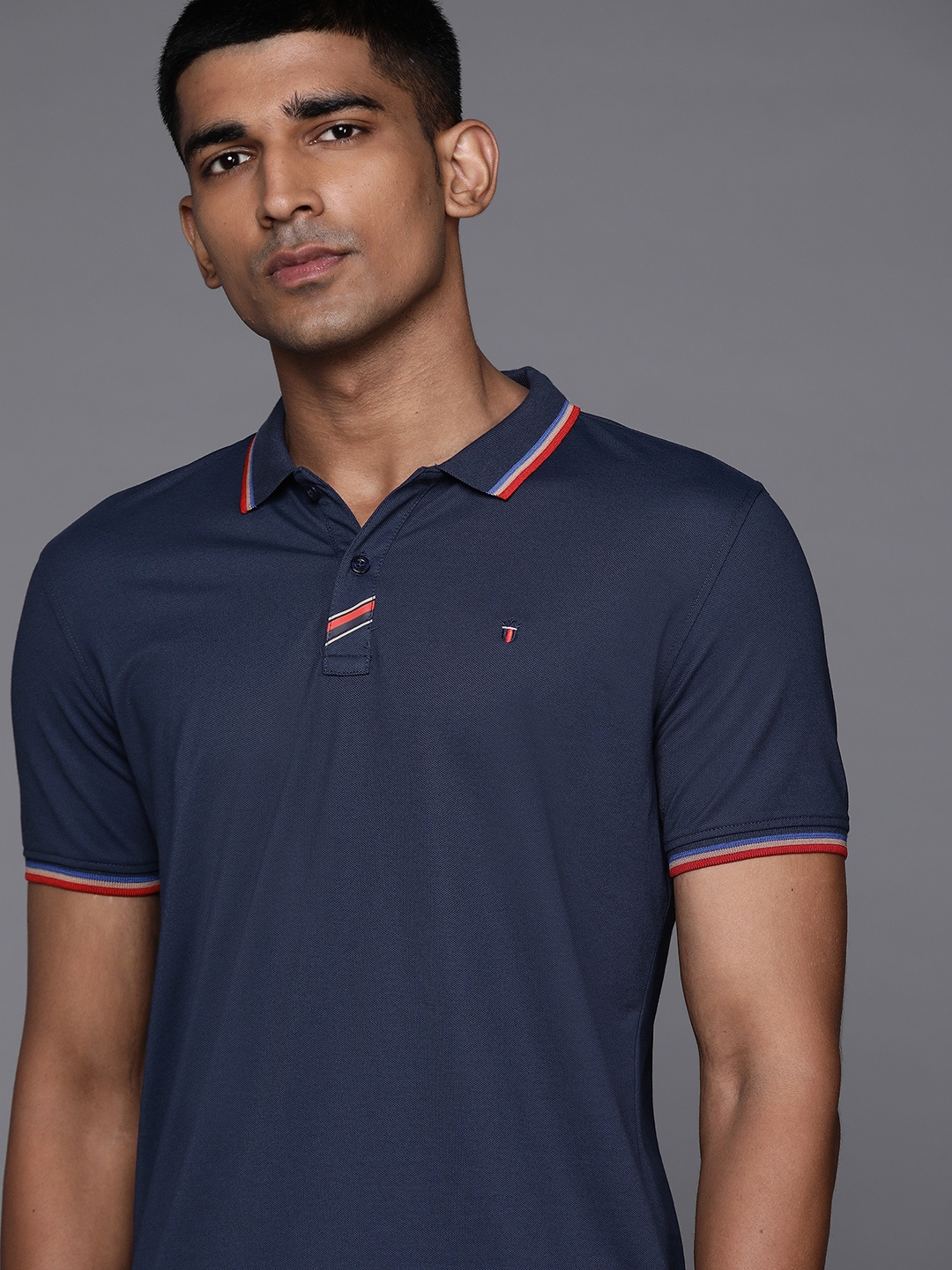 

Louis Philippe Sport Men Navy Blue Solid Polo Collar T-shirt