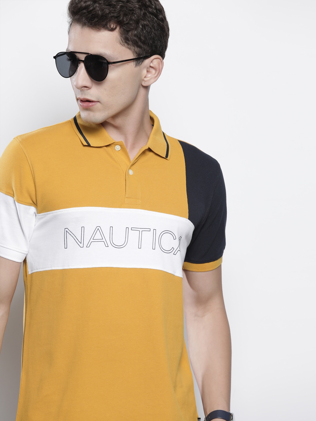 

Nautica Men Mustard Yellow & White Pure Cotton Colourblocked Polo Collar T-shirt