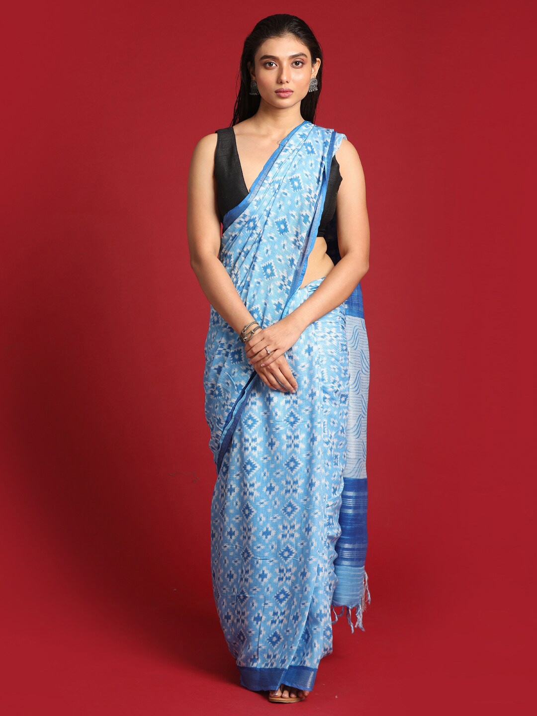 

Indethnic Blue & Silver-Toned Ethnic Motifs Zari Bhagalpuri Saree