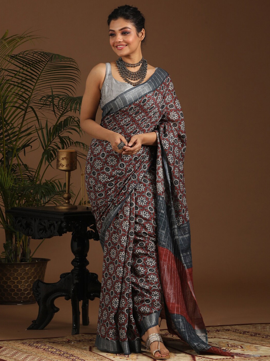 

Indethnic Maroon & Silver-Toned Zari Bhagalpuri Saree