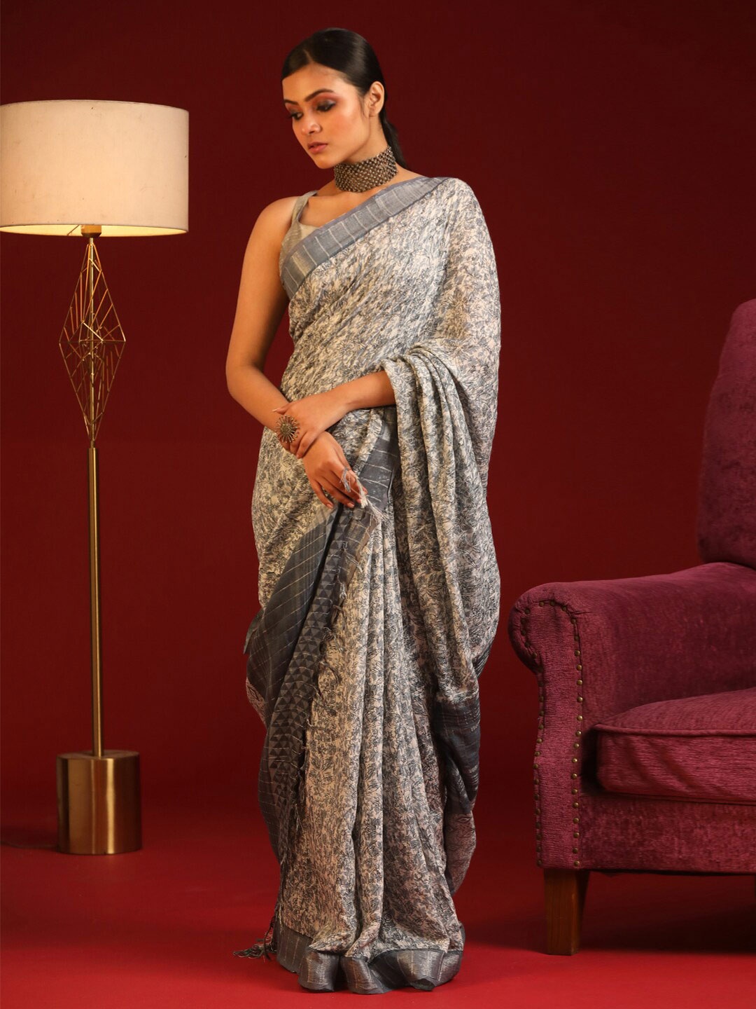 

Indethnic Grey & Silver-Toned Floral Zari Bhagalpuri Saree