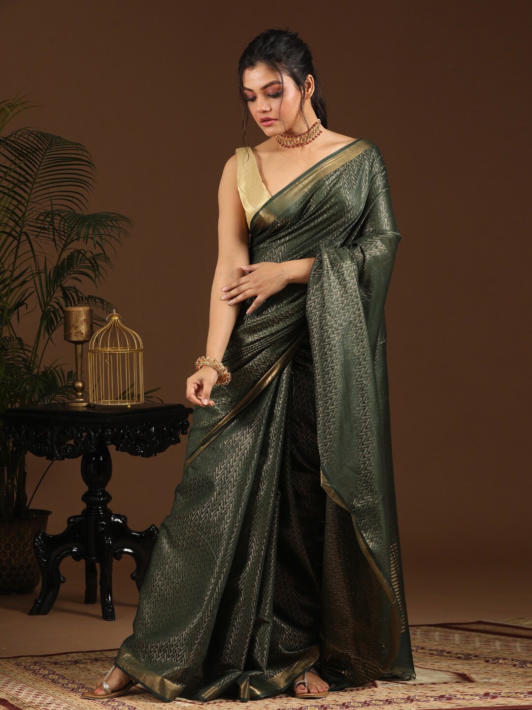 

Indethnic Green & Gold-Toned Ethnic Motifs Zari Bhagalpuri Saree