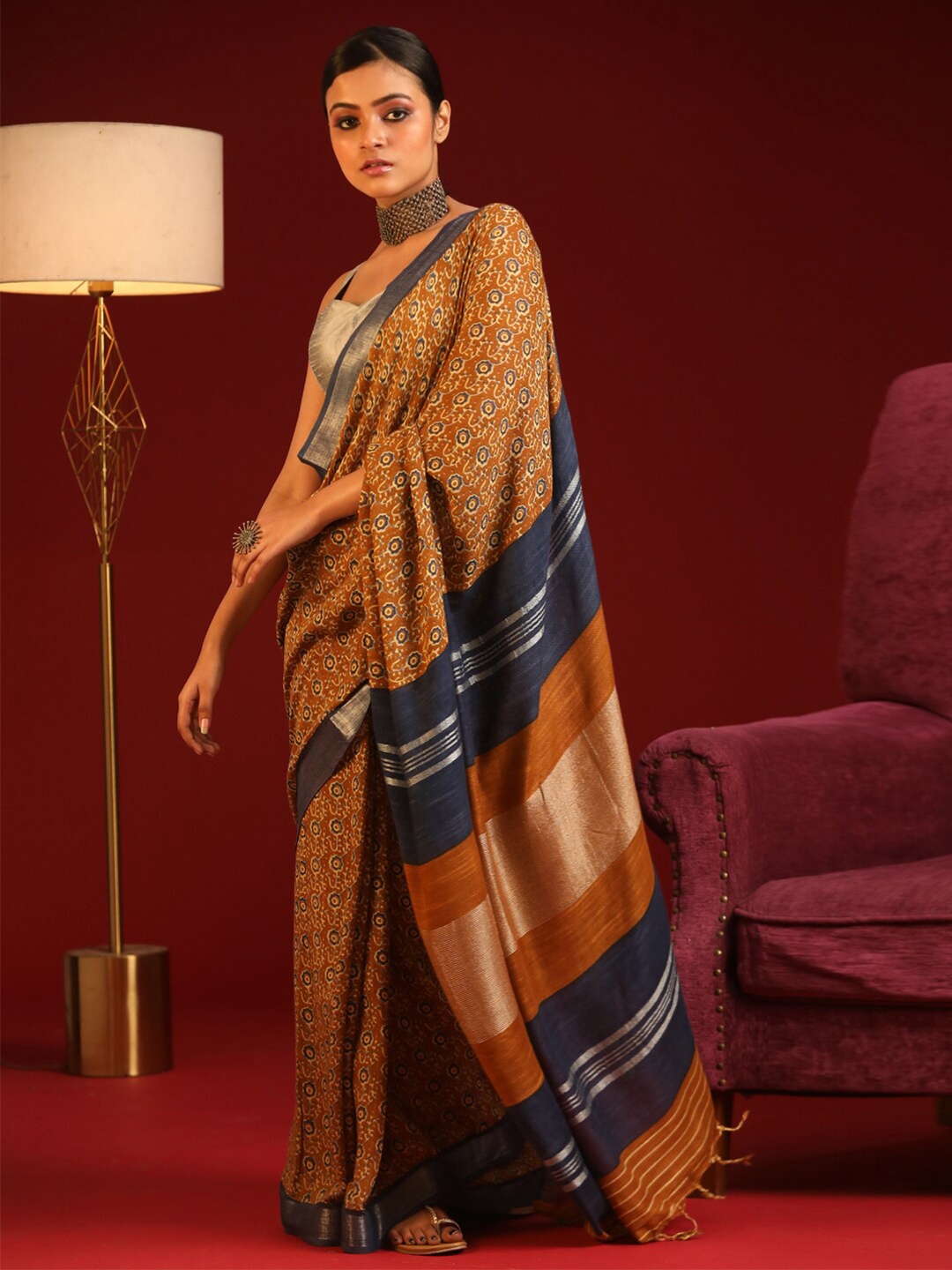 

Indethnic Mustard Yellow & Blue Ethnic Motifs Zari Bhagalpuri Saree
