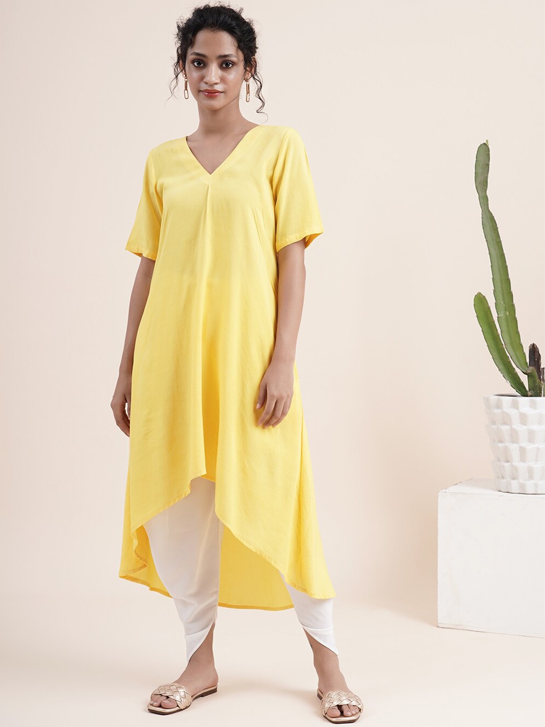 

Abhishti Women Yellow Kurta With Pleat Sewn Neckline