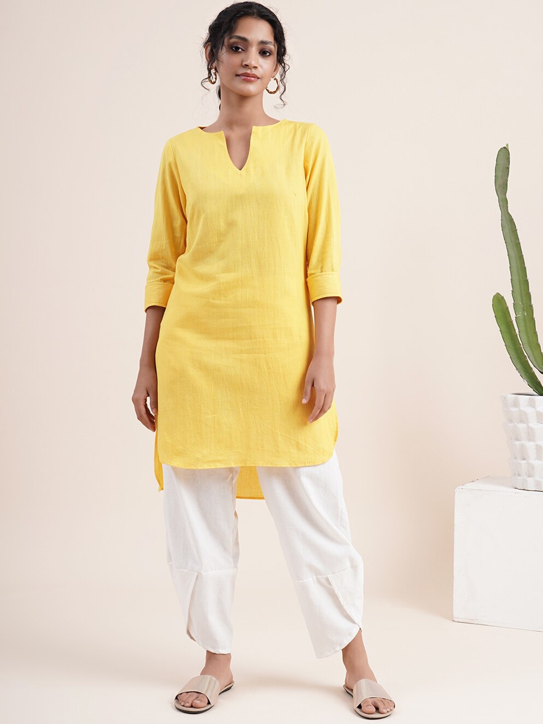 

Abhishti Women Yellow Thread Work Kurta with V- Notched Neck