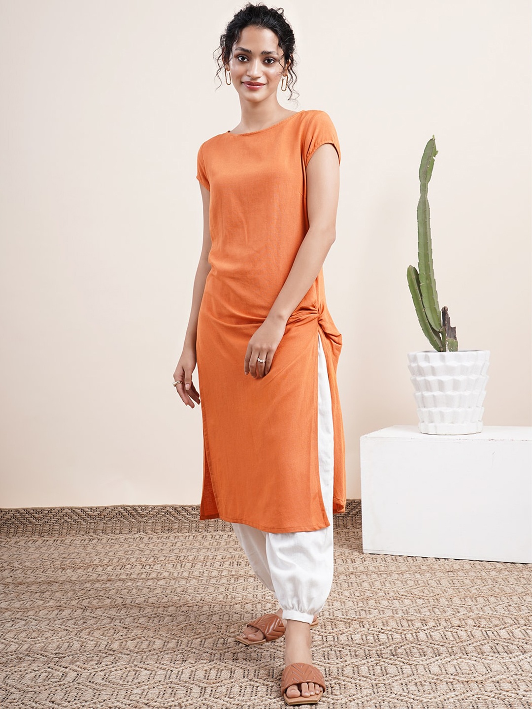

Abhishti Women Orange Twist Knot Kurta