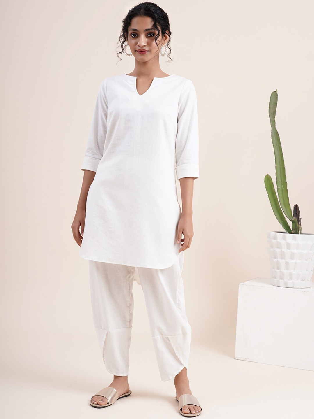 

Abhishti Women White Striped Angrakha Kurti with Dhoti Pants & With Dupatta