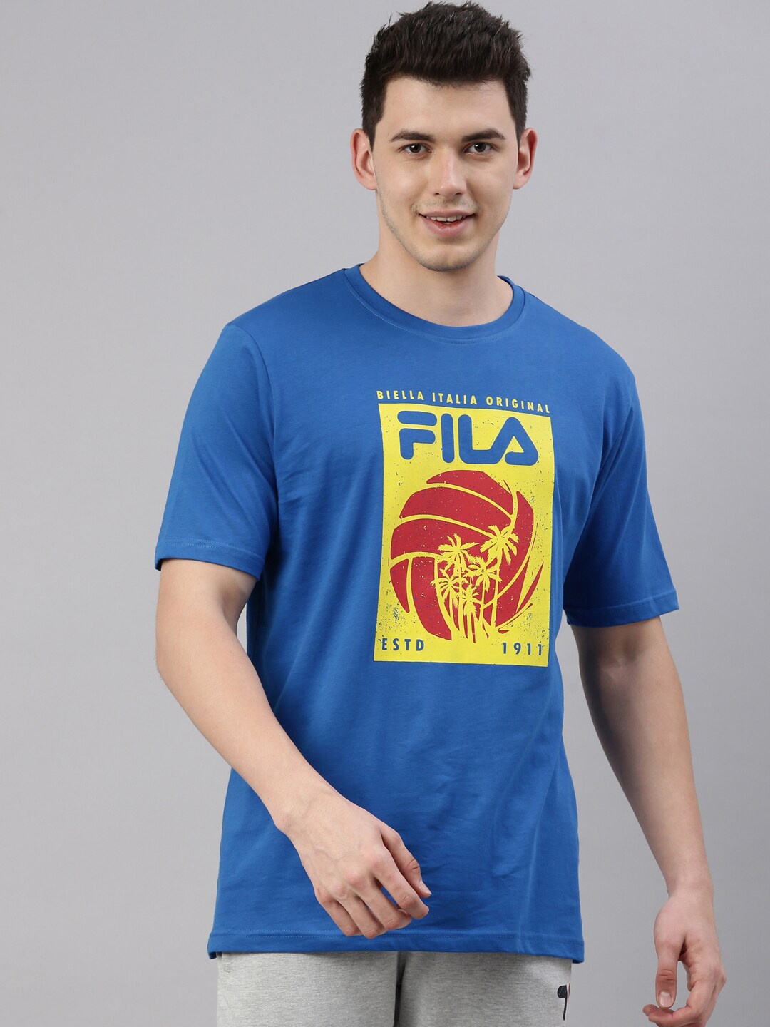 

FILA Men Blue Printed Organic Cotton Applique Training or Gym T-shirt
