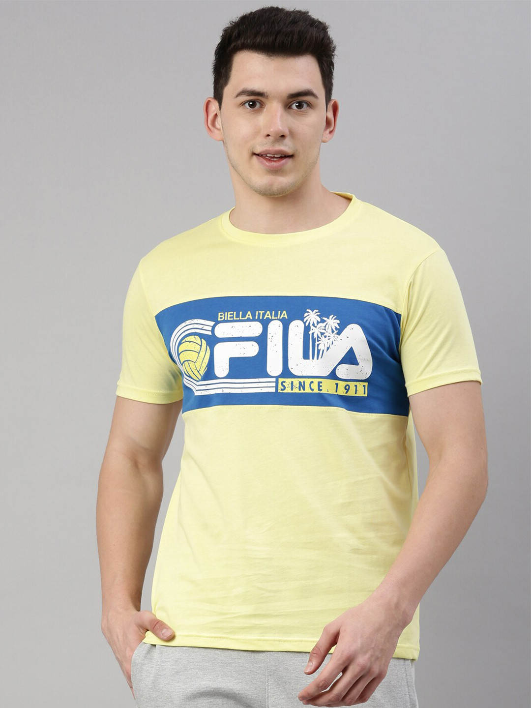 

FILA Men Yellow Typography Printed Organic Cotton Applique Training or Gym T-shirt