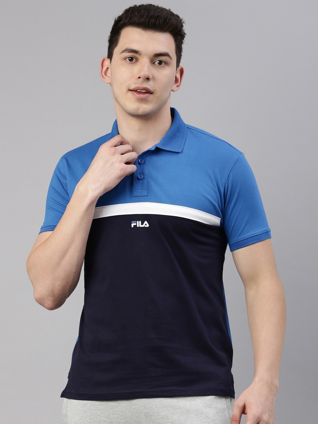 

FILA Men Blue Colourblocked Polo Collar Organic Cotton Training or Gym T-shirt