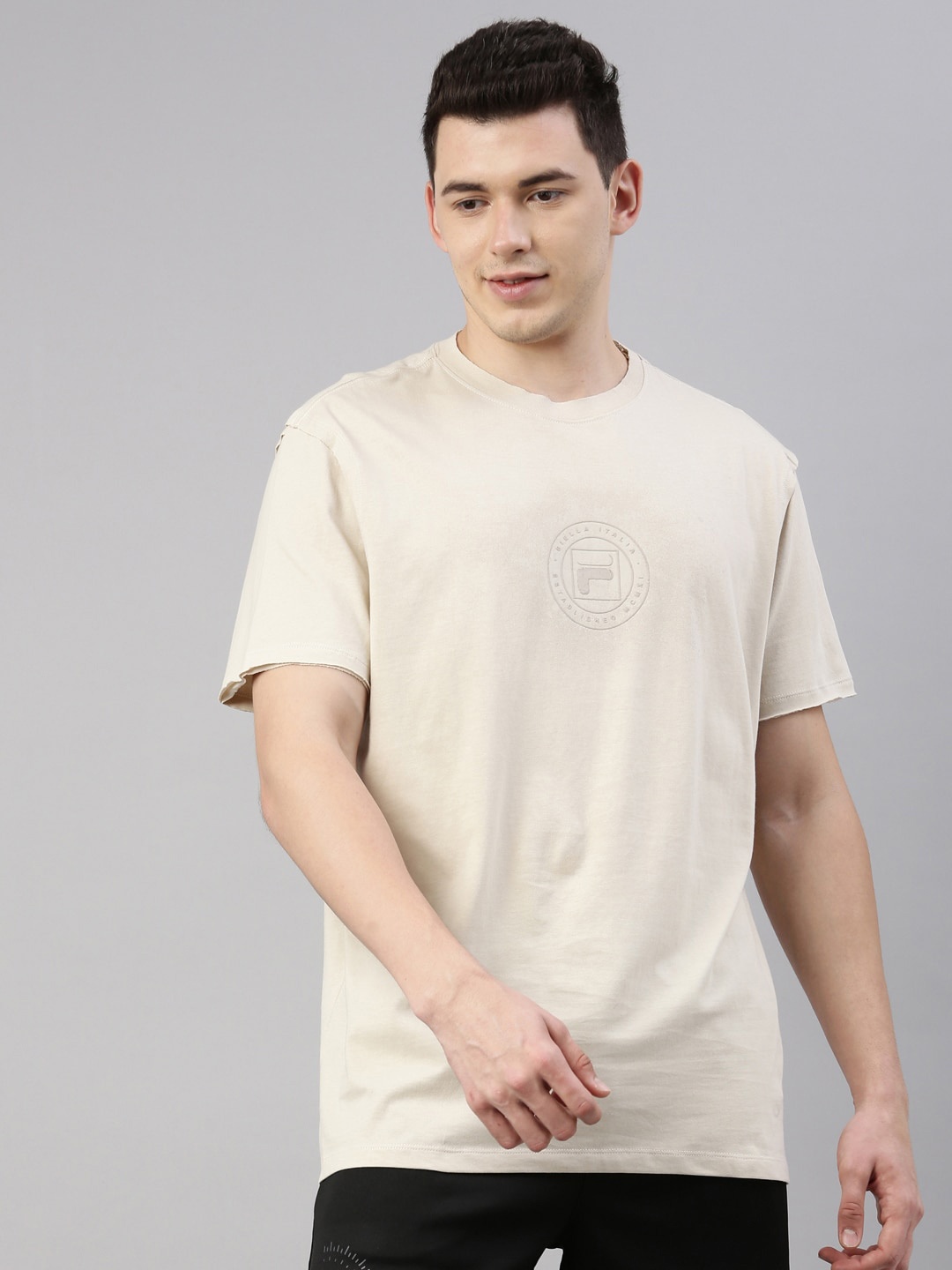 

FILA Men Beige Typography Printed Organic Cotton Training or Gym T-shirt