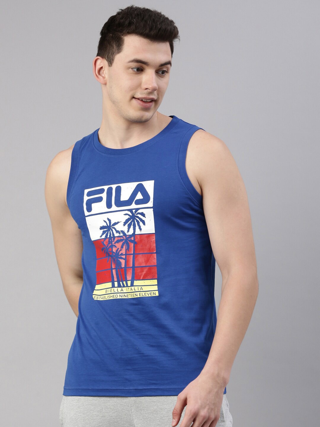 

FILA Men Blue Typography Printed Organic Cotton Applique Training or Gym T-shirt