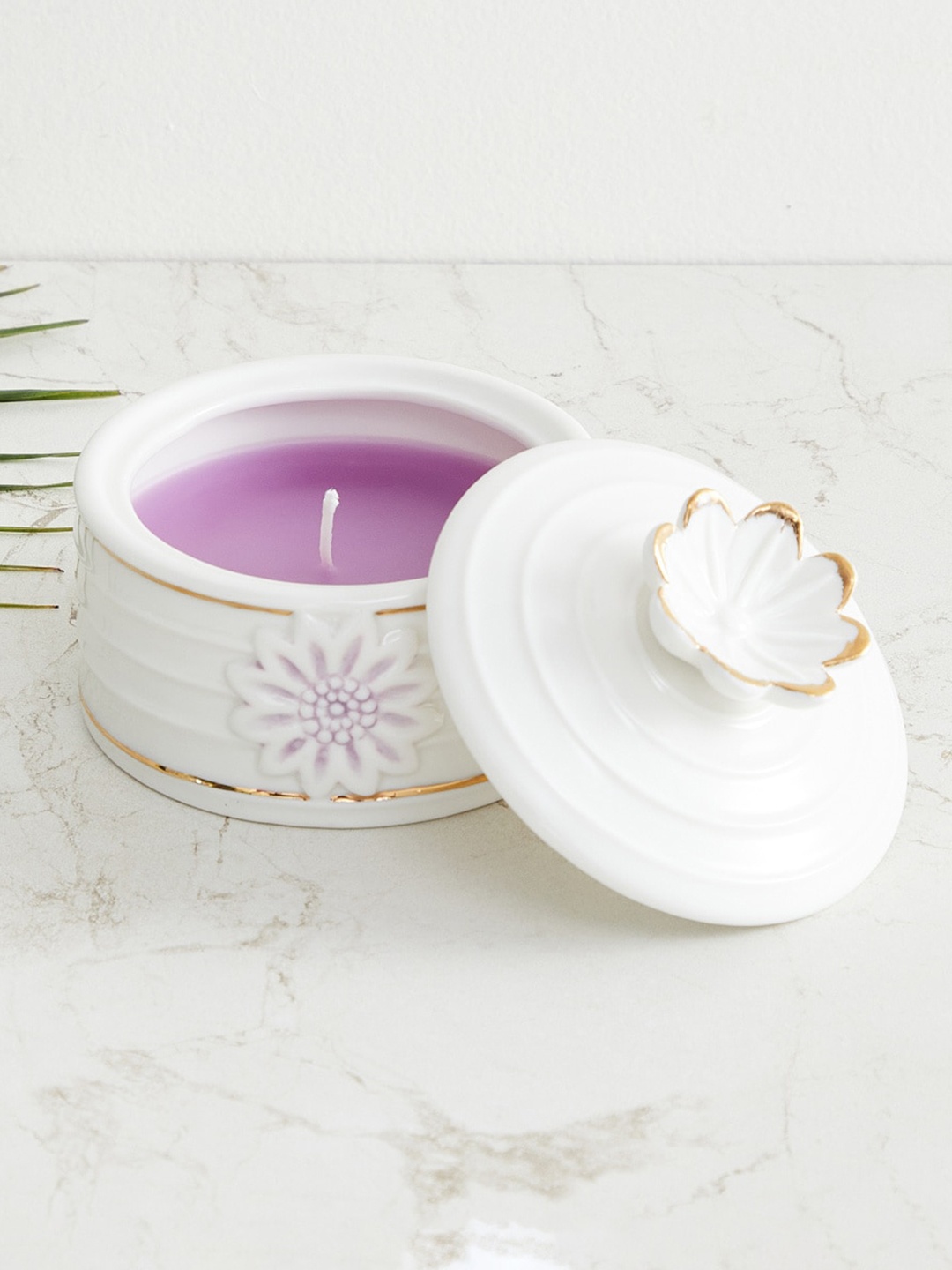 

Home Centre White & Purple Solid Ceramic Floral Accent Jar Candle With Lid