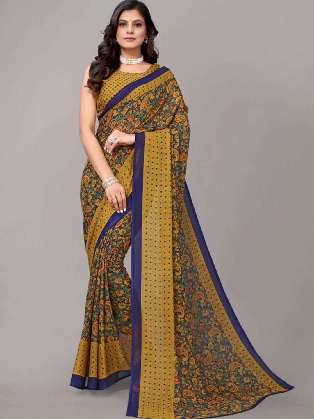 

Yashika Yellow & Blue Floral Georgette Saree