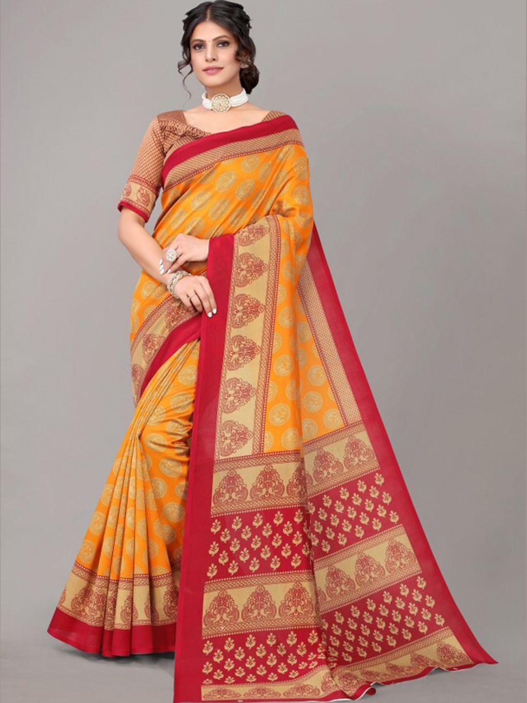 

Yashika Mustard & Red Ethnic Motifs Printed Art Silk Saree
