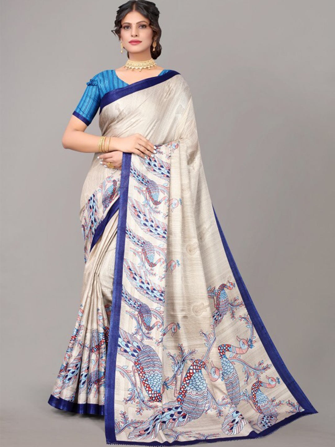

Yashika Blue & White Ethnic Motifs Art Silk Saree