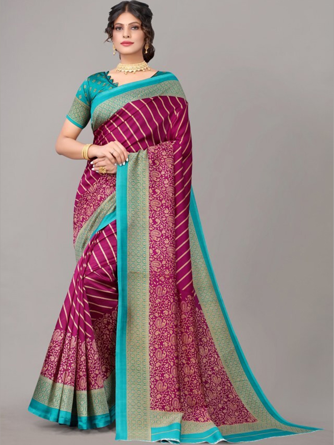 

Yashika Purple & Blue Ethnic Motifs Art Silk Saree