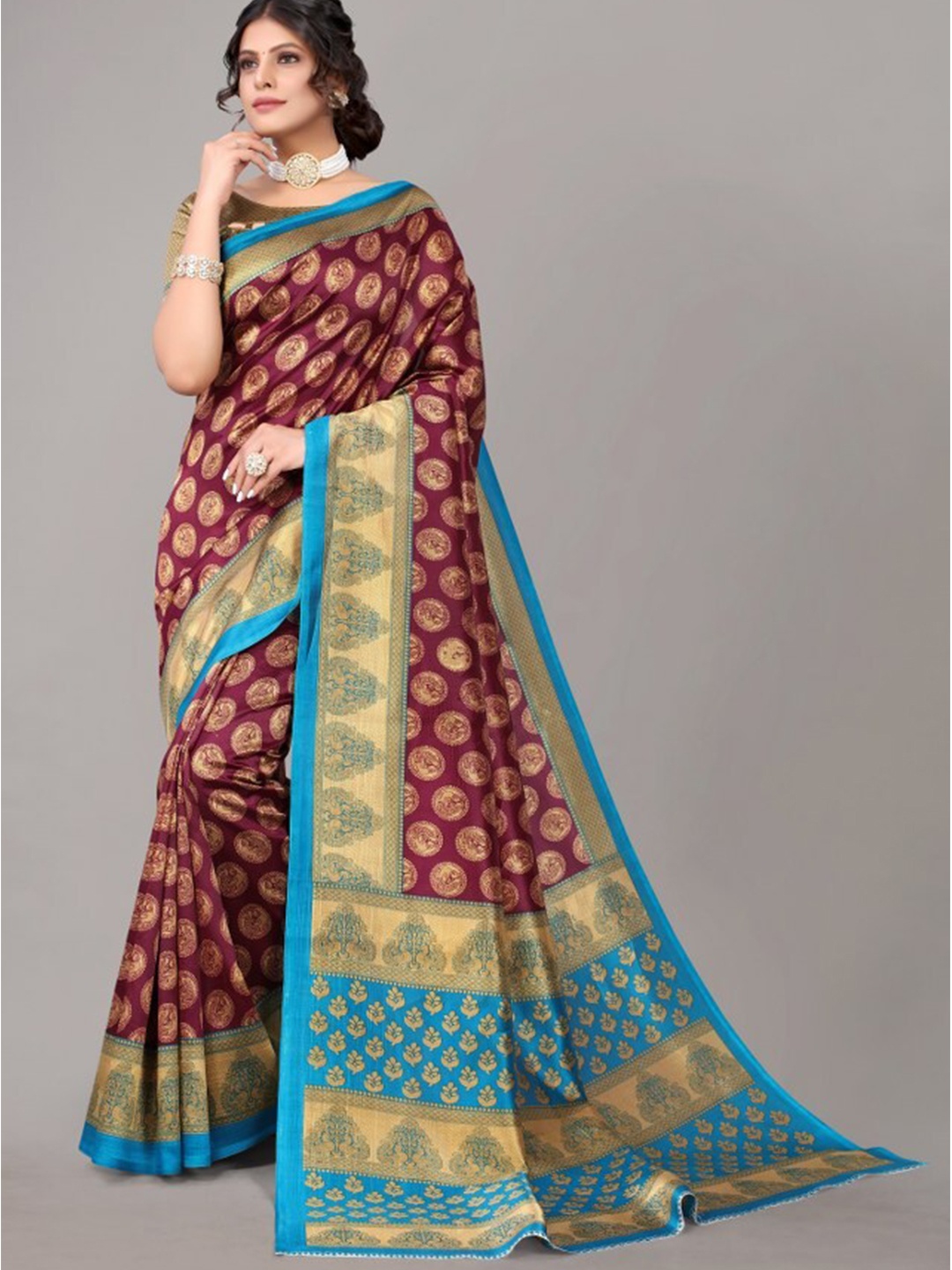 

Yashika Purple & Beige Ethnic Motifs Printed Art Silk Saree