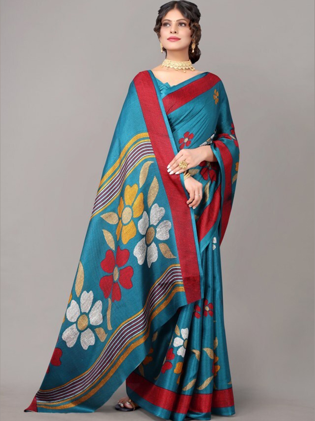 

Yashika Teal & Maroon Floral Art Silk Saree