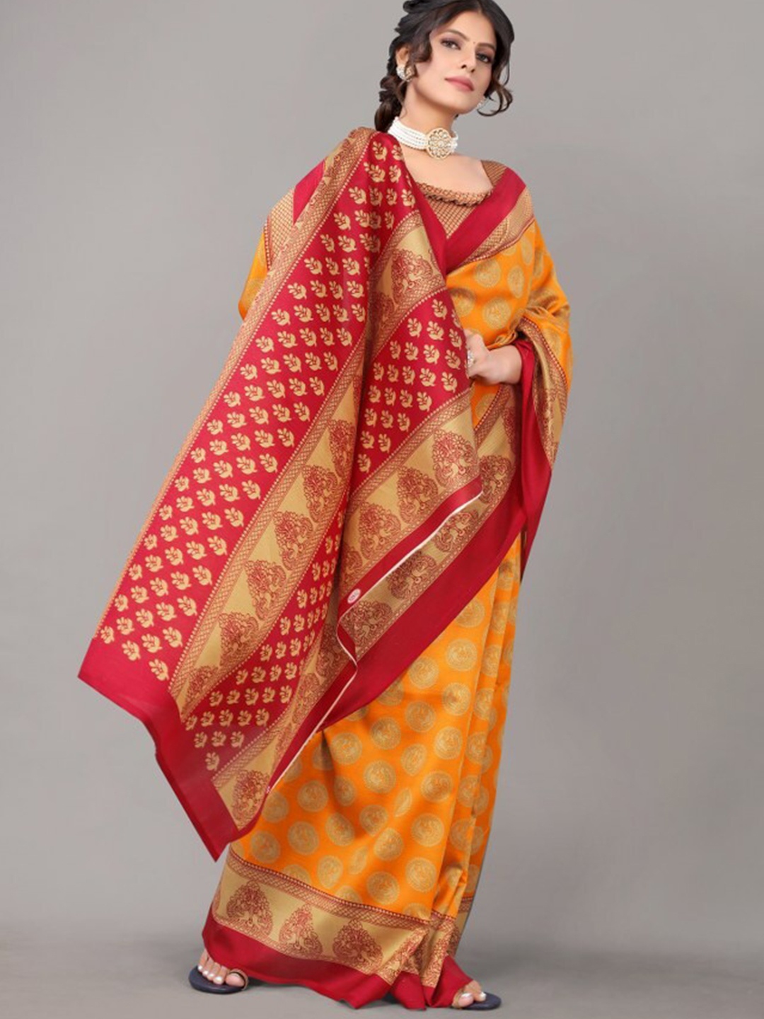 

Yashika Mustard & Maroon Ethnic Motifs Printed Art Silk Saree