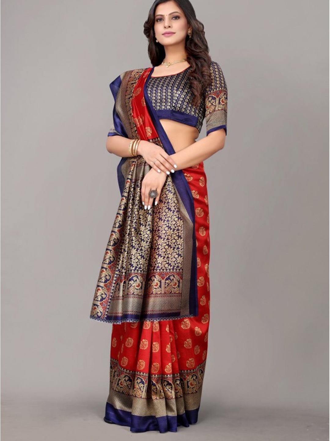 

Yashika Red & Blue Ethnic Motifs Printed Art Silk Saree