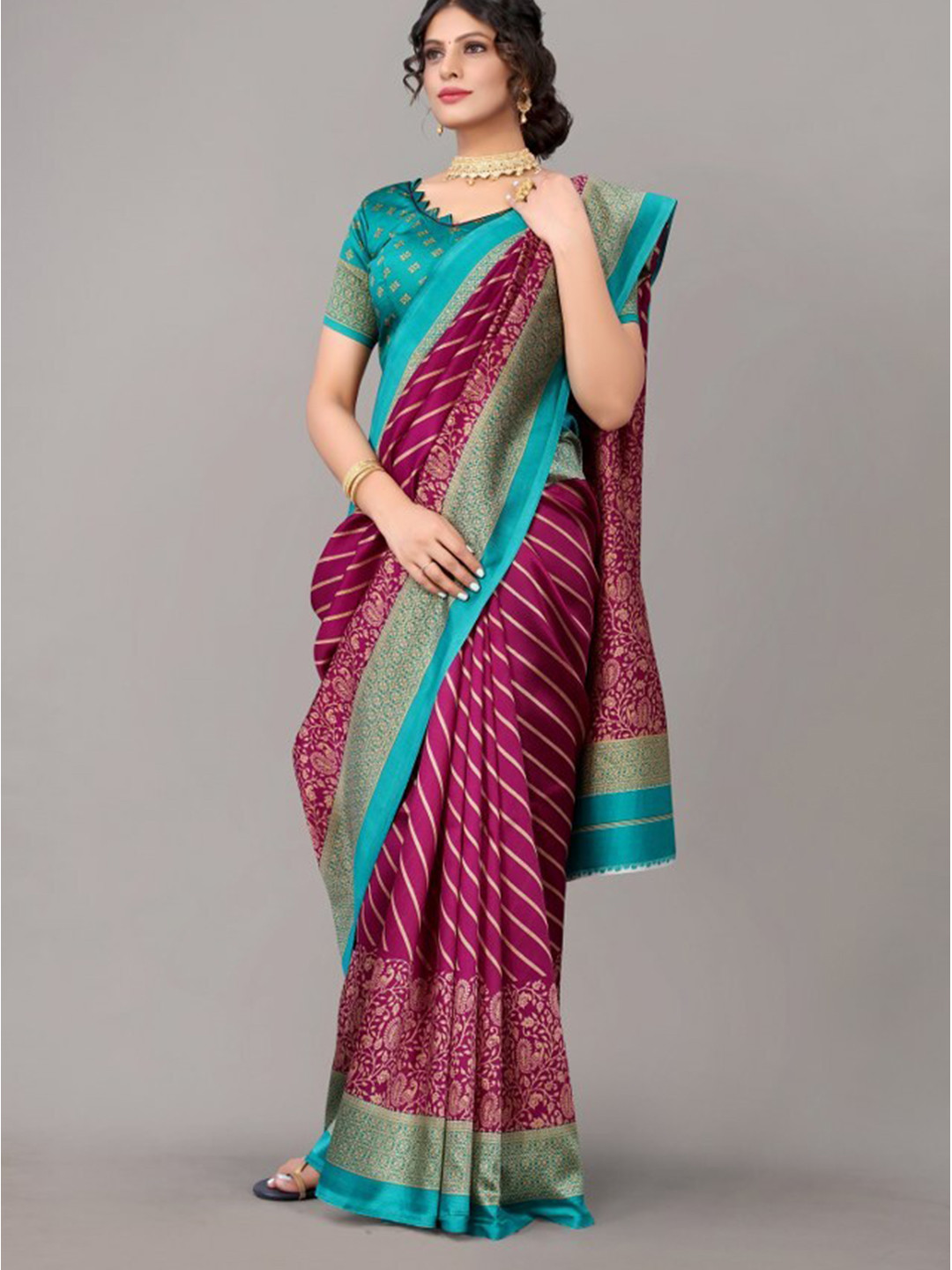 

Yashika Purple & Blue Ethnic Motifs Printed Art Silk Saree