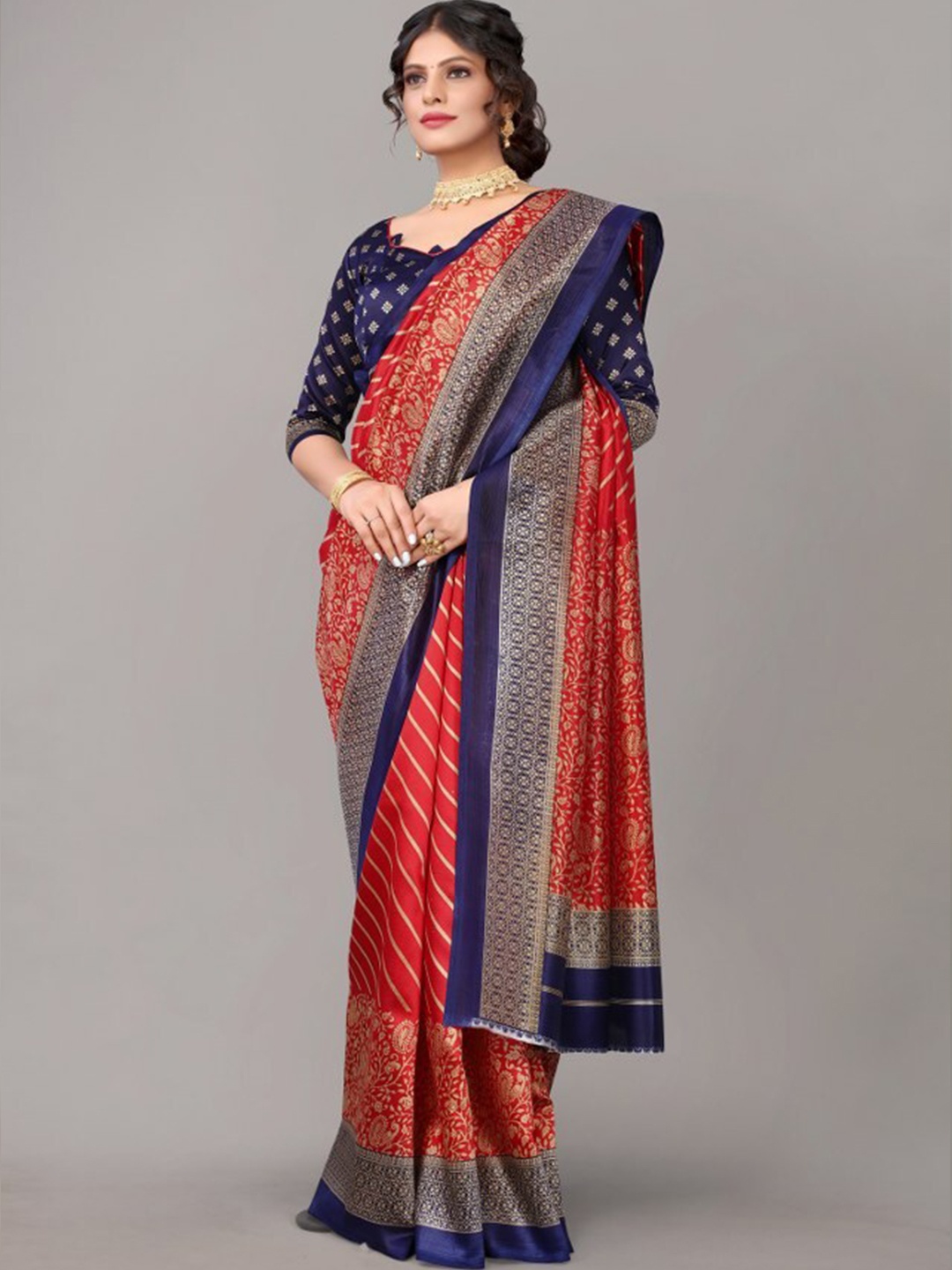 

Yashika Red & Blue Ethnic Motifs Art Silk Saree