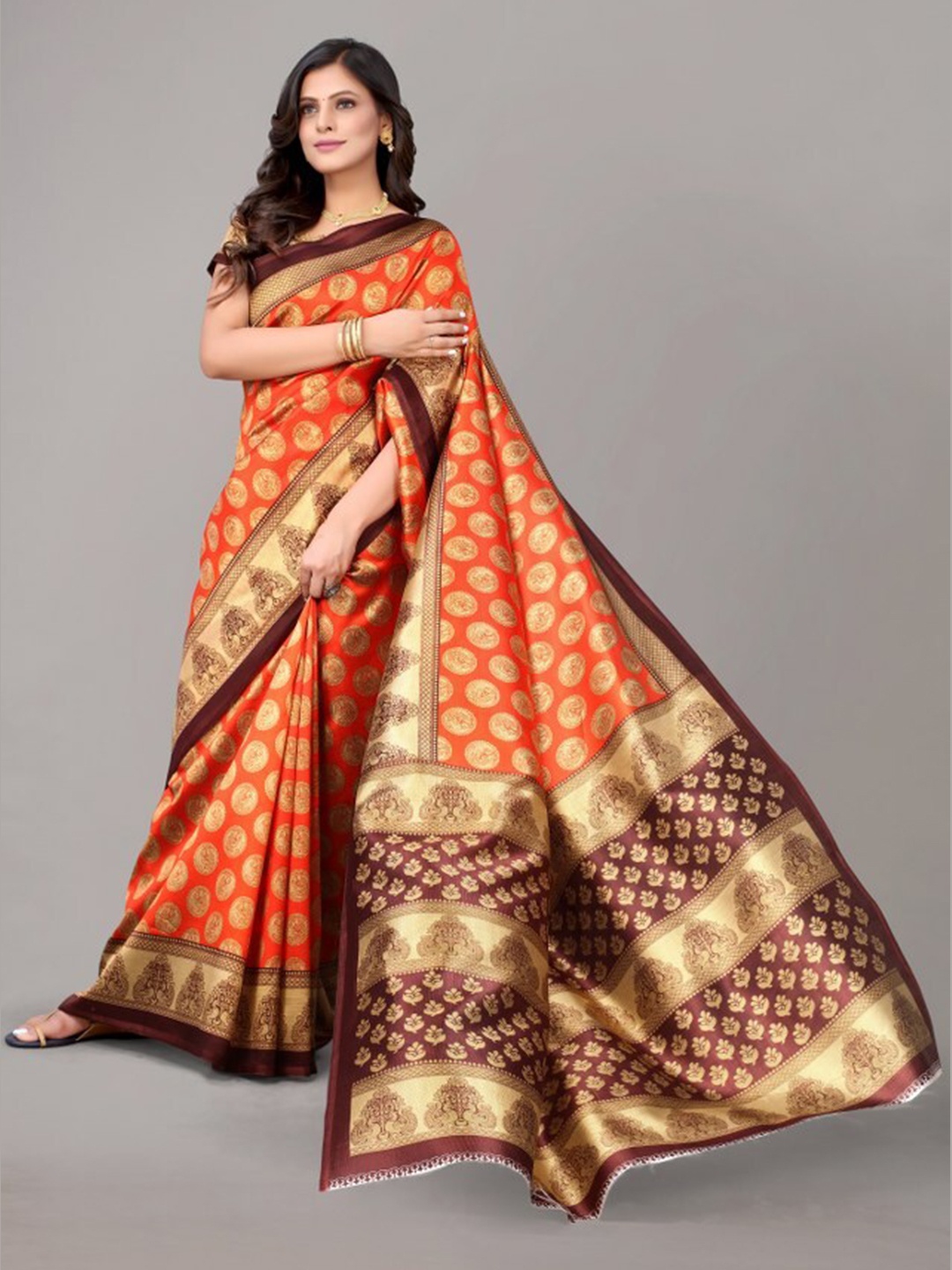 

Yashika Orange & Brown Ethnic Motifs Printed Art Silk Saree