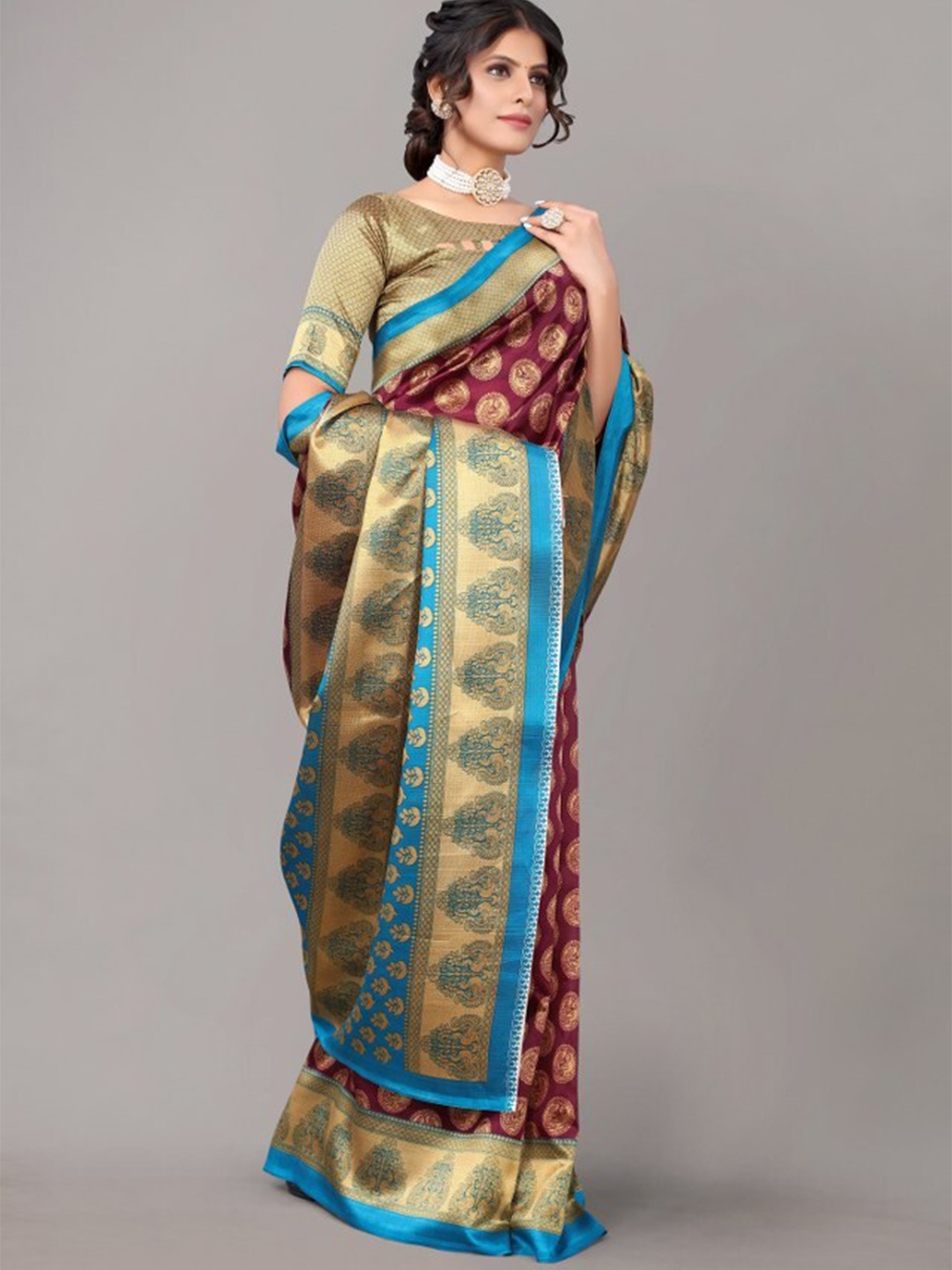 

Yashika Purple & Blue Ethnic Motifs Art Silk Saree