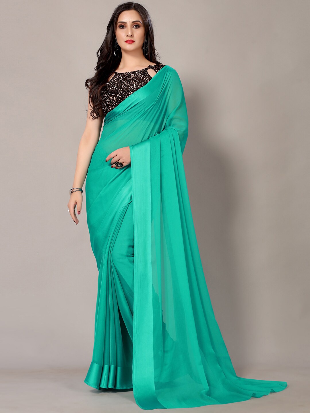 

HRITIKA Turquoise Blue Solid Embellished Polly Chiffon Designer Saree