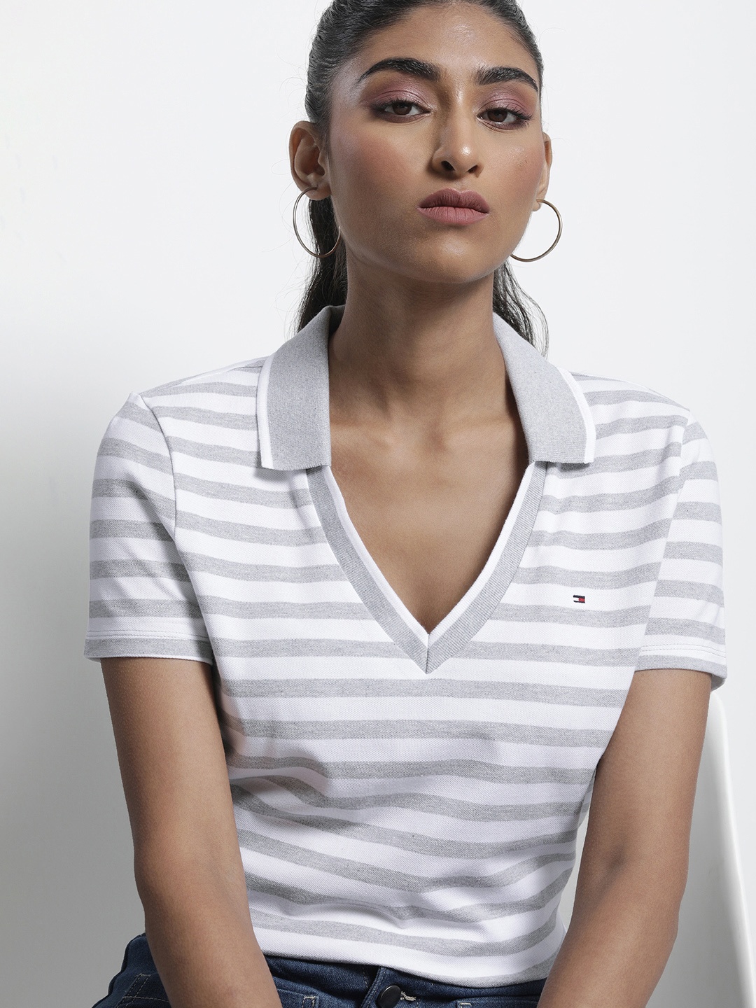 

Tommy Hilfiger Women Grey & White Striped Polo Collar T-shirt