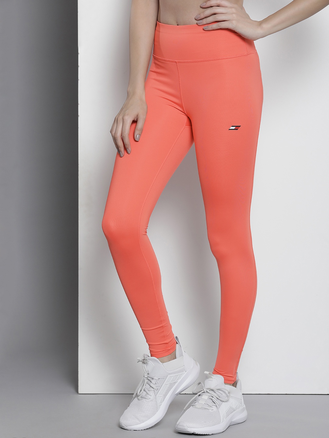 

Tommy Hilfiger Women Mid-Rise Outdoor Moisture Wicking Tights, Coral
