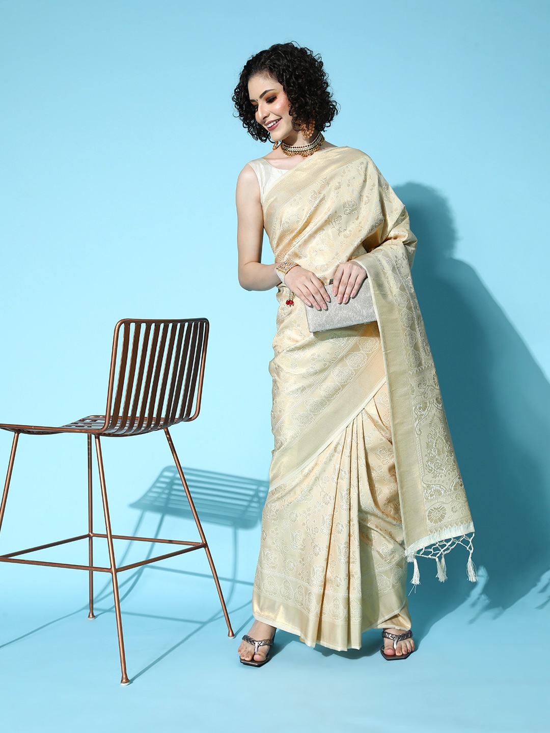

Saree mall Ethnic Motifs Saree With Woven Design Border, Cream