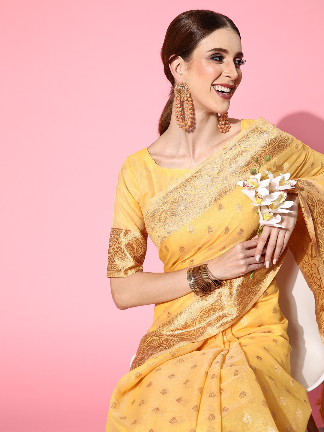 

Saree mall Yellow Ethnic Motifs Zari Banarasi Sarees