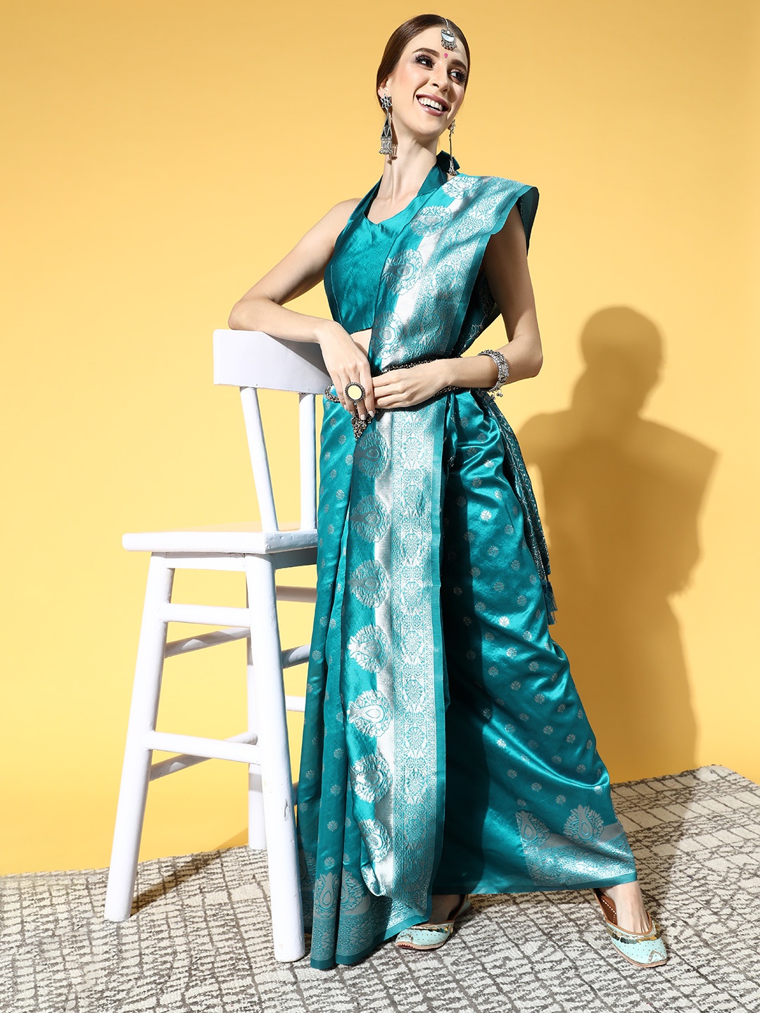 

Saree mall Teal Ethnic Motifs Zari Silk Blend Banarasi Sarees