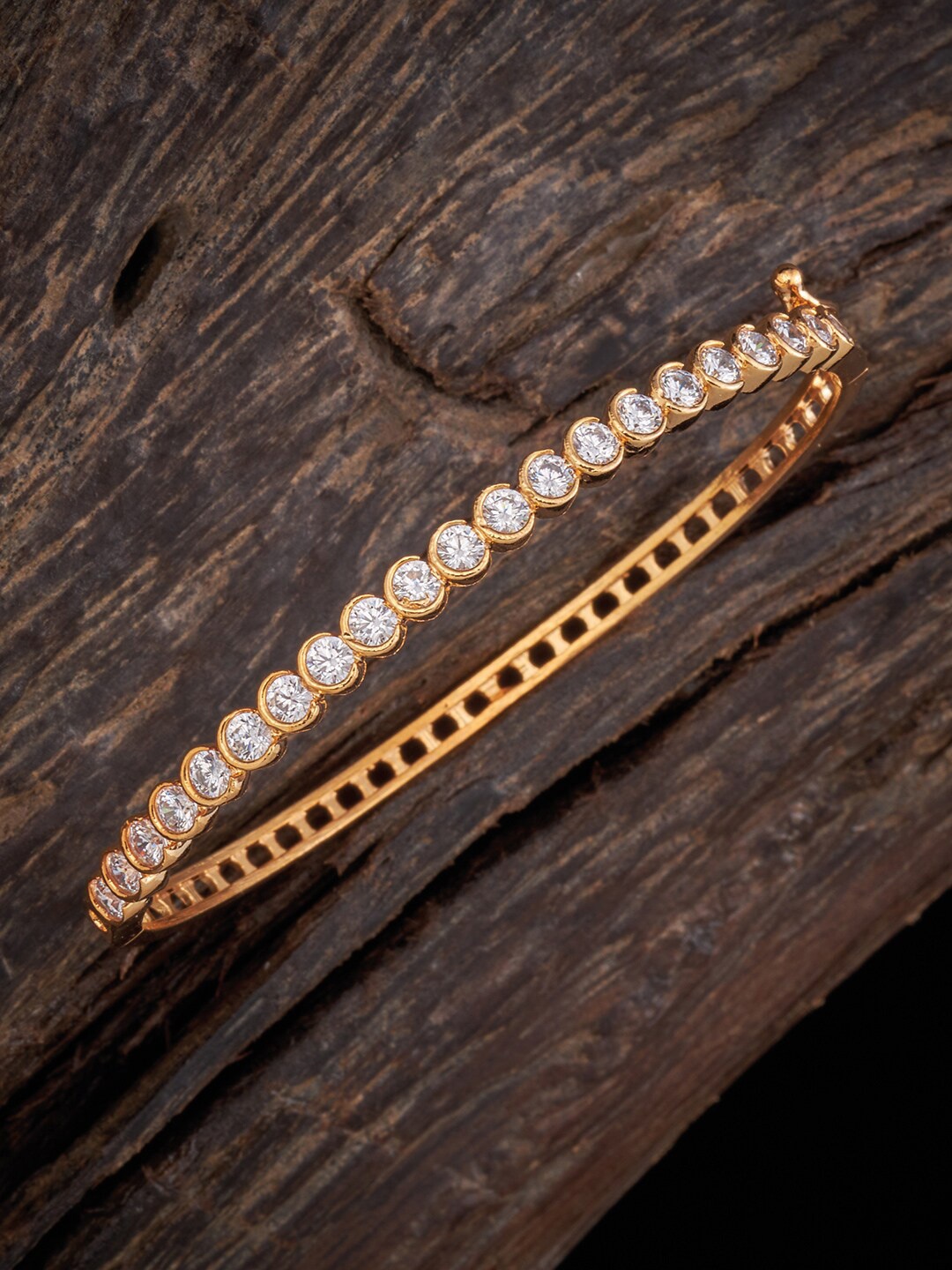 

Kushal's Fashion Jewellery Women Gold-Toned & White Gold-Plated Kada Bracelet