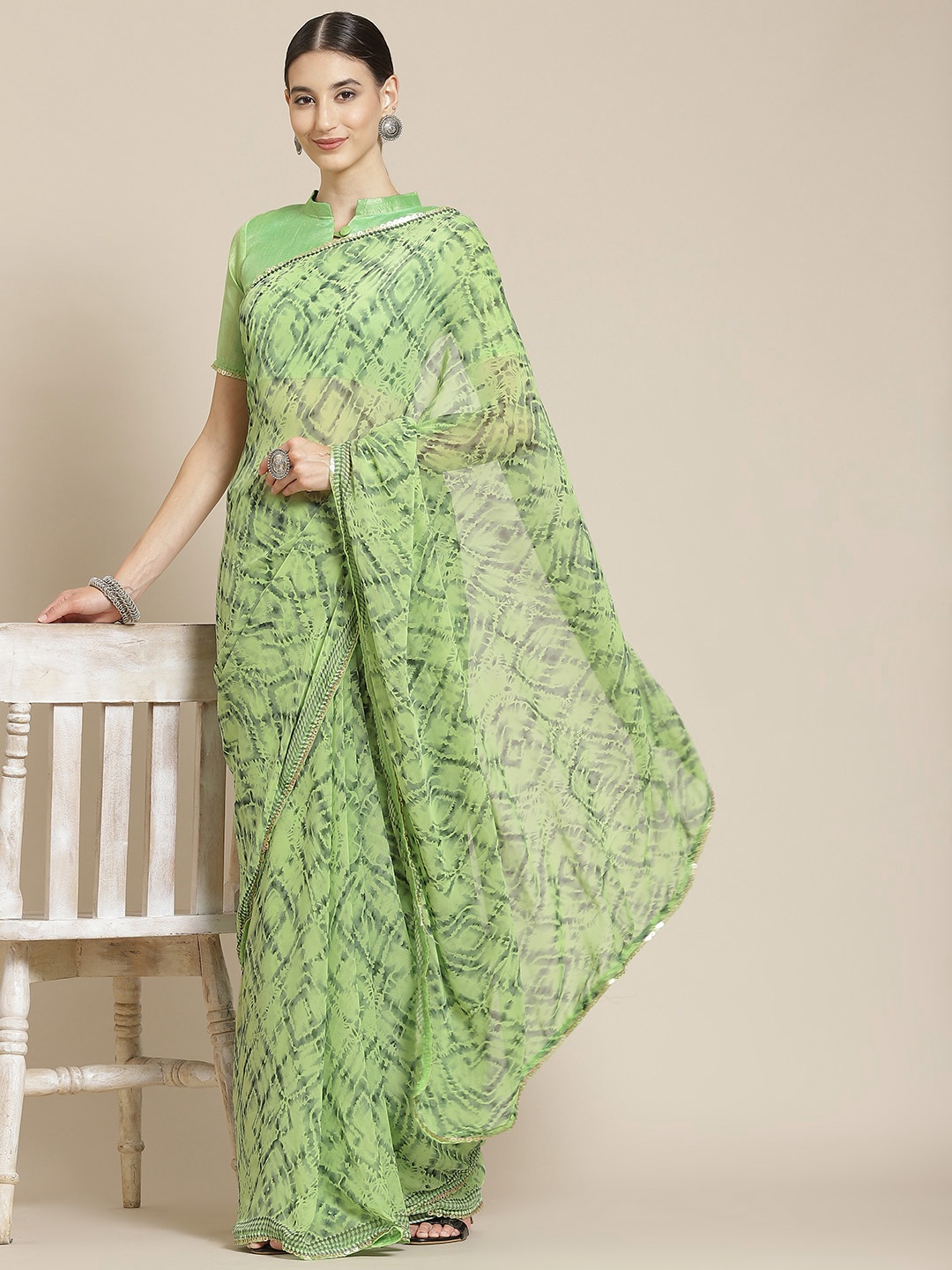 

Satrani Green Printed Saree